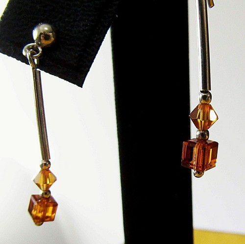 Eleganti orecchini lunghi - , a