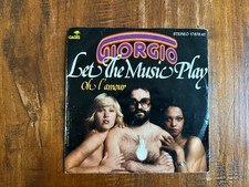 Giorgio = Giorgio Moroder -