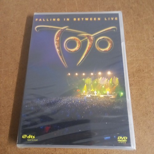 Toto falling between live - -, in