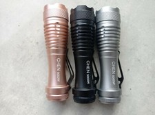1 MINI TORCIA TATTICA LED  5000 LUMENS