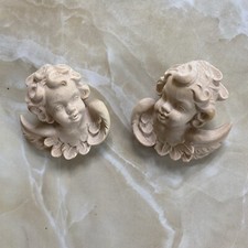 Pair of angels hanging in