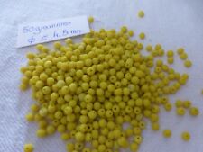 perle vintage, au poids 50 gr de  perle ronde en verre jaune  ORIGINE INDE 1980