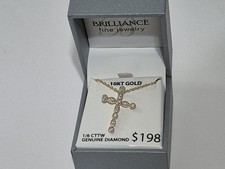 Croce brillante in oro giallo