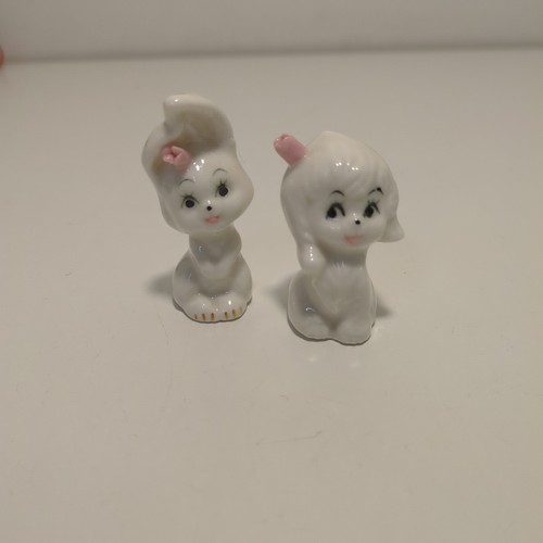 Due statuine ceramica - in,