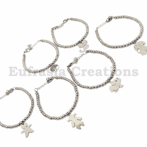 Bracciale acciaio mano cane - in,