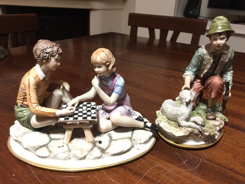Statuine in ceramica - in,