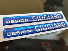 COPPIA ADESIVI RESINATI DESIGN GIUGIARO ALFA ROMEO FIAT ARGENTO CROMO BLU TUNING