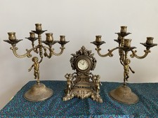 Coppia Candelabri + Orologio carica manuale in ottone  in ottime condizioni