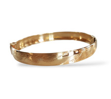 Bracciale da donna rigido a fascia in oro 18 kt con incisioni