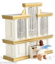 Angelo gonna corta all'organo