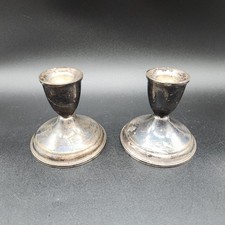 Coppia di candelabri pesati