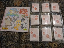 ALBUM VUOTO  E SET COMPLETO  DI FIGURINE DA ATTACCARE BABY LOONEY TUNES 