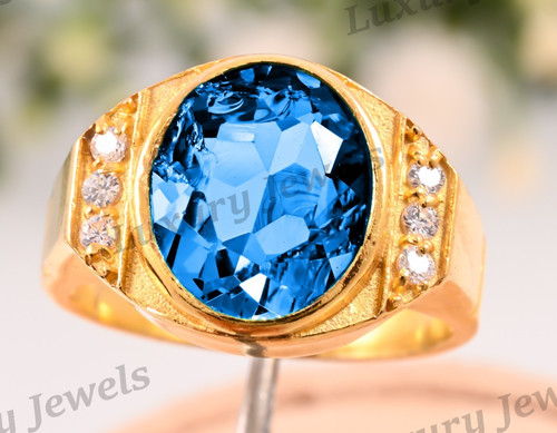 Anello uomo topazio blu