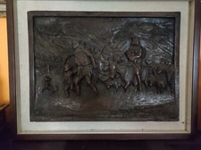 Pannello di noce scolpito a bassorilievo