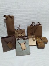 Lotto Scatoline bigiotteria gioielli colore bronzo con fiocchetto e bustine 