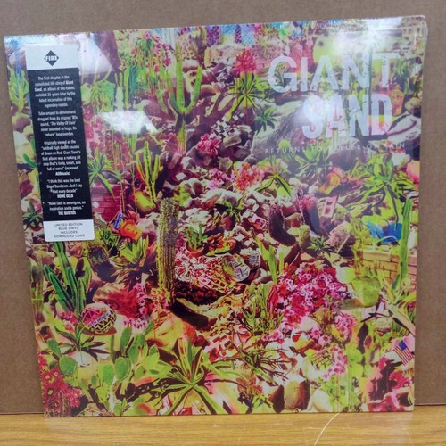 Giant sand returns to - sand,