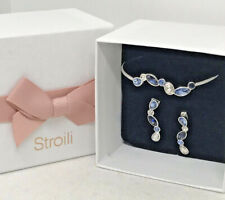 PARURE STROILI BRACCIALE RIGIDO E ORECCHINI PENDENTI RODIATI CON PIETRE BLU'