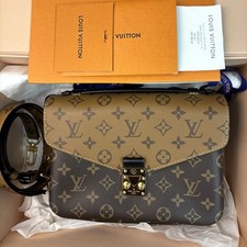 Pochette Louis Vuitton Reverse