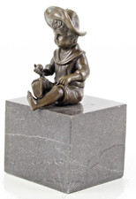 SCULTURA BRONZO ragazzo seduto