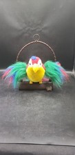 Peluche animato pappagallo