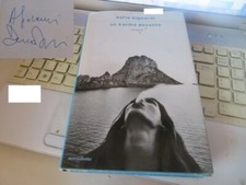 LIBRO "UN KARMA PESANTE" di