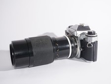 Nikon FE reflex 35 mm con zoom