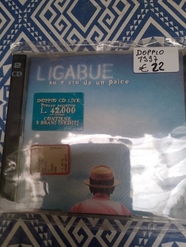 Ligabue giù un - e,