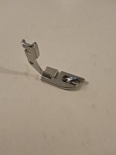 Piedino pressa orlo arrotolato