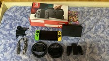 Nintendo Switch con Mariokart 8 Deluxe + Accessori (usata Pochissimo)