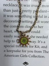 Collana bussola bambola