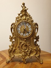 Antico orologio in bronzo