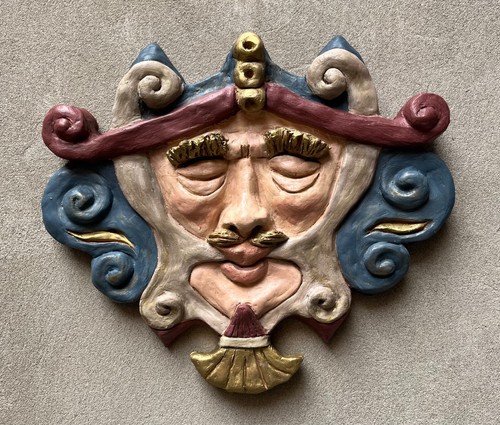 Maschera muro terracotta - in,