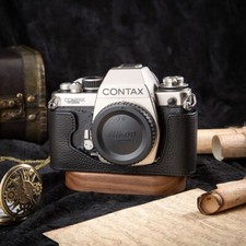 Custodia mezza fotocamera per