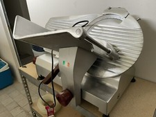 Affettatrice professionale in acciaio con affila lame