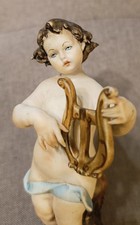 ANTICA STATUETTA IN PORCELLANA