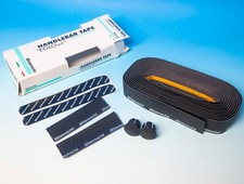 Nastro Manubrio  Bianchi traforato nero   + tappi manubrio