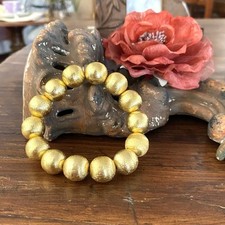 Bracciale da donna color oro satinato alta bigiotteria molla elegante cerimoni