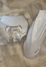 KIT ANTERIORE FARO + PARAFANGO