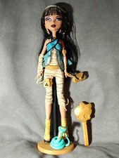 MONSTER HIGH G1 - Muñeca CLEO DE NILE 1 WAVE, Mascota HISSETTE con stand y peine