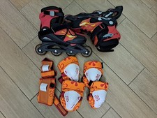 pattini a rotelle rossi, usati, taglia 38/41