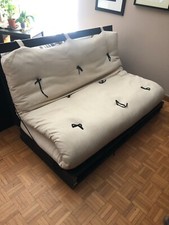 futon in Cotone sfoderabile bianco. Con doghe in legno nero