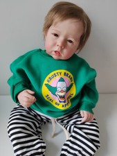 Bambola neonato rifinita