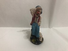 STATUINA FIGURA PRESEPE IN GESSO PASTORE SEDUTO CON CANE ALTA CM.9.