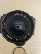 Yashica FX-3 Super 2000 Body 35mm  reflex analogica con flash e vari obiettivi