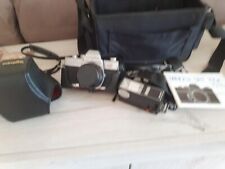 macchina fotografica analogica MINOLTA srt 100x completa di flash e borsa 70 eur