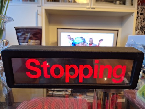 Bus stopping sign mirror - "stopping",