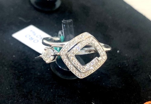 Anello solitario pavè doppio