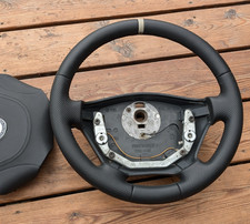 NEW LEATHER STEERING WHEEL for
