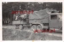 Camion a 3 assi con rimorchio