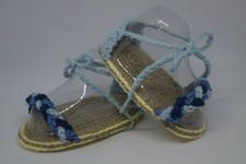 Sandali a fascia intrecciata
